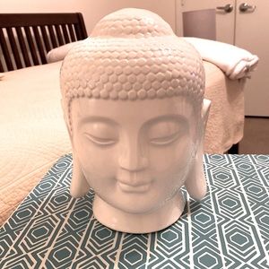 Ceramic Buddha head figure.